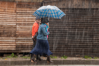 Xhosa couple in the rain, Langa, RSA