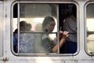 Bus commuter hot day, Yangon, Myanmar