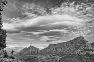 Solo photographer and dramatic sky Table Mountain