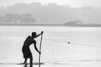 Fisherman set their nets, Myanmar