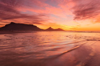Cape Town Table Mountain pink sunset from Milnerton Lagoon