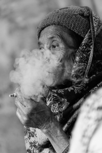 Candid street smoker, Nepal