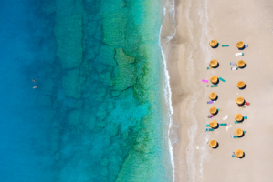 Tiny swimmers. Image was taken leaning over a cliff not with a drone!! Butterfly Beach Turkey