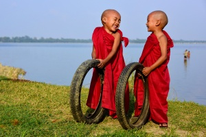 Candid Shot of 2 monk siblings playing, Myanmar