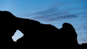 Tiny person inside the arch, Canyonlands, USA
