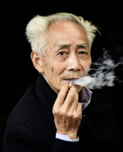 Poised In the moment portrait, Chengdu teahouse, China