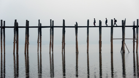 Three walkers Ubein bridge Three walkers Ubein bridge